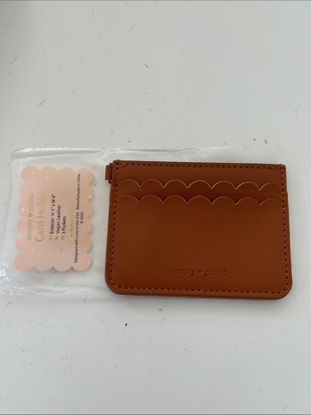 Simply Gilded Scalloped Card Holder in Cognac Brown
